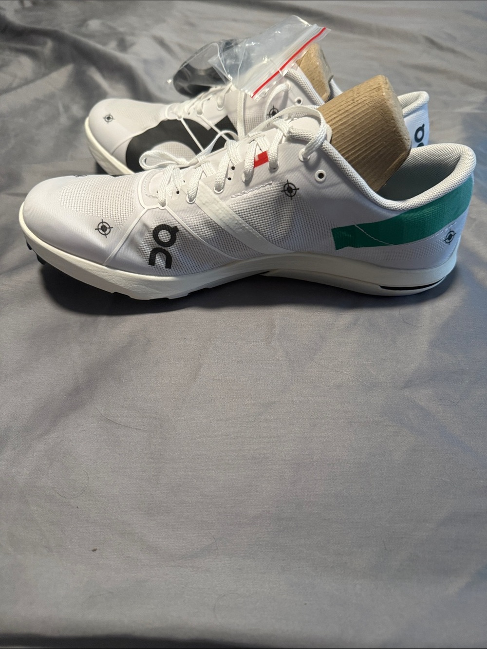 OnCloud Cloudspike 10000M White Sneakers with Teal Heel Accent and Black Logo